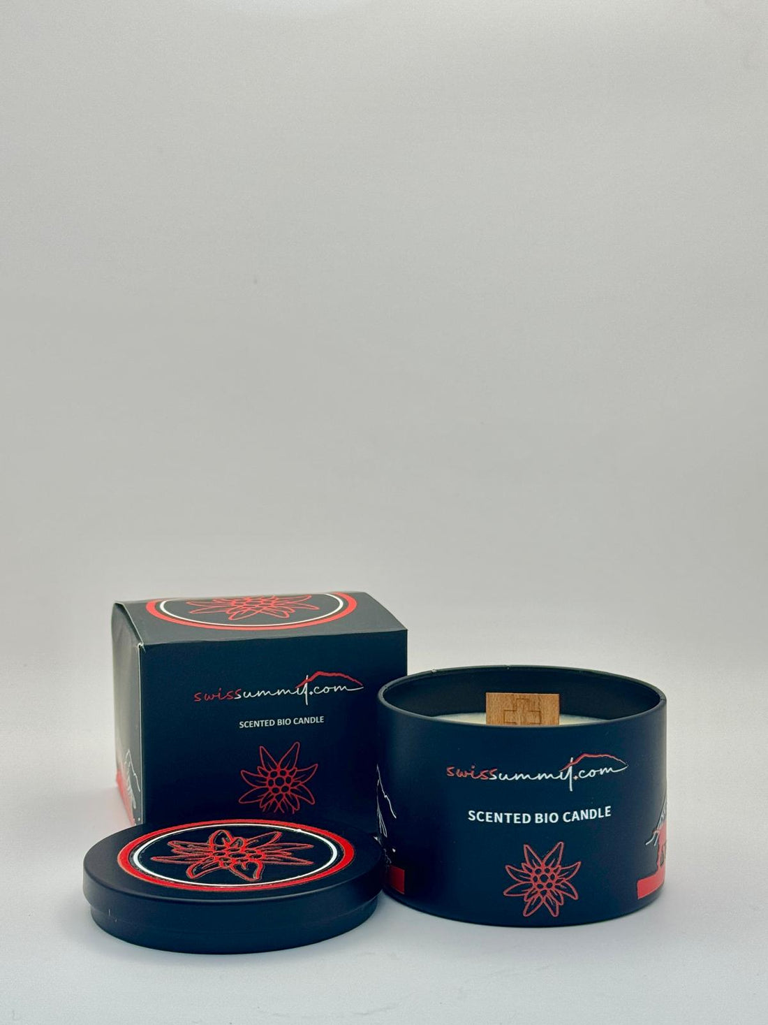 Duftkerze Schwingerkönig in schwarzer Dose offen mit Verpackung